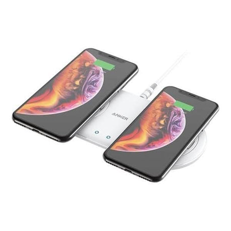 Anker dual wireless charger pad with two smartphones charging simultaneously in white