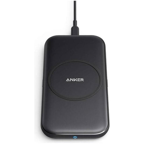 Anker black fast wireless charger with compact design and USB charging cable