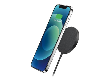Anker magnetic wireless charger with black round design charging a smartphone securely