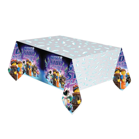 LEGO movie party table cover with colorful characters and Never Stop Playing design by Fancy Dress