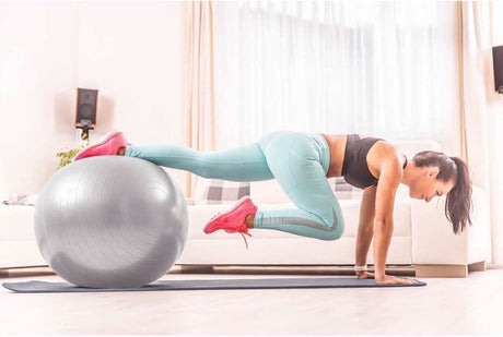 Calitek 65cm exercise ball with pump in gray used for home fitness strength training