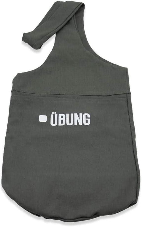 Calitek yoga kit bag with pockets in dark gray featuring a single shoulder strap and ÜBUNG logo