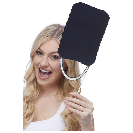 Woman holding blank black signboard decoration for use with Union Jack tableware props