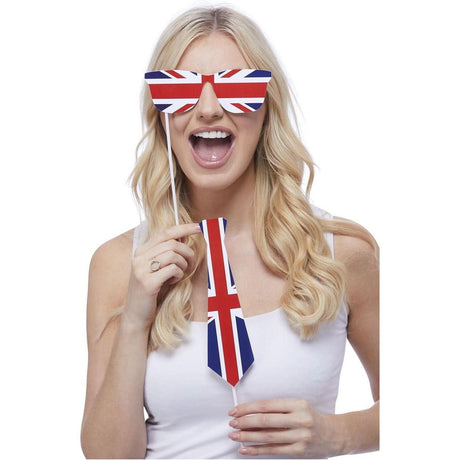 Woman holding Union Jack tableware props including novelty glasses and tie for themed decorations
