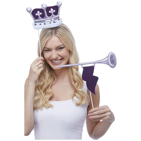 Woman holding party decorations props including a purple crown and a trumpet for Fancy Dress celebrations