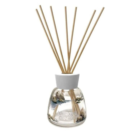 Yankee Candle amber and sandalwood reed diffuser with natural wooden sticks in clear glass bottle