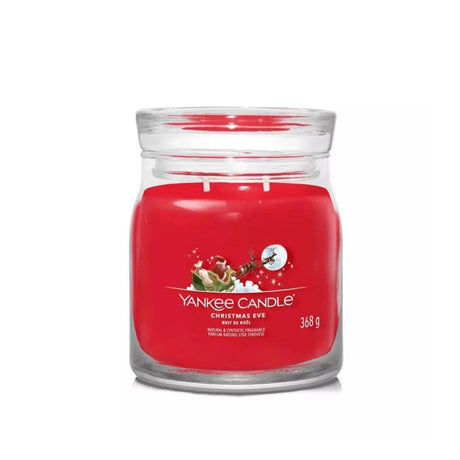 Yankee Candle Christmas Eve jar red scented candle with Santa sleigh design in glass container