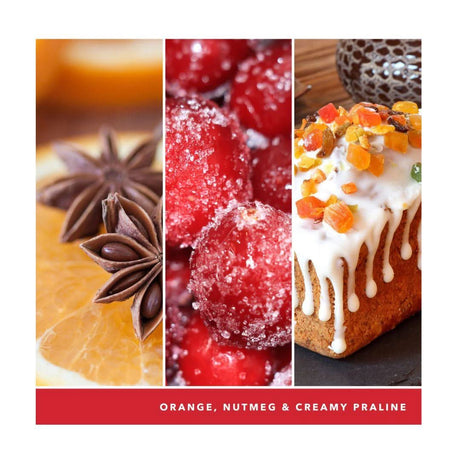 Yankee Candle Christmas Eve jar scent with orange, nutmeg, and creamy praline notes