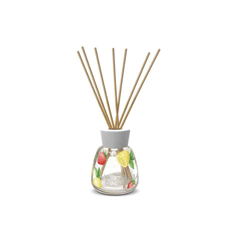 Yankee Candle reed diffuser with fruit design glass bottle and natural reeds for home fragrance