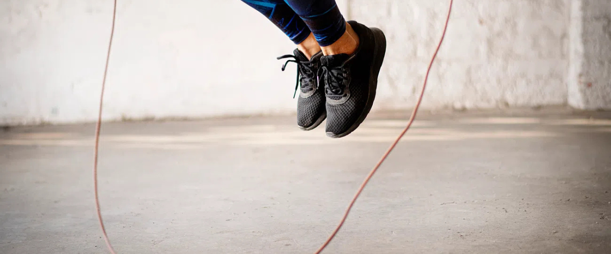 Person jumping with a weighted skipping rope 