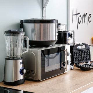 Affordable home electricals collection featuring kitchen appliances like blenders, microwaves, and waffle makers