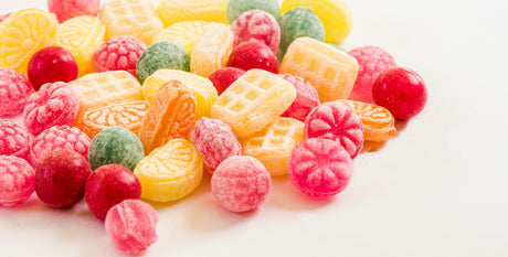 Assortment of colourful sweets representing affordable food and drink essentials at CLICKK Home Store
