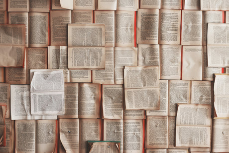 Collection of open old books with yellowed pages perfect for World Book Day gifts