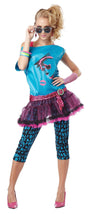 Woman wearing 1980s pop star costume with bright blue top, pink tutu skirt, patterned leggings, and sunglasses