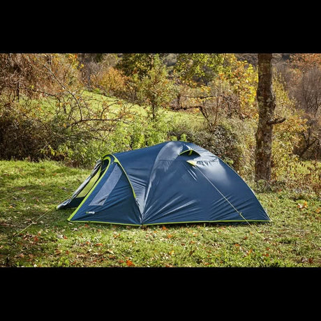 3 person dome tent in blue with a spacious design set in a natural outdoor environment