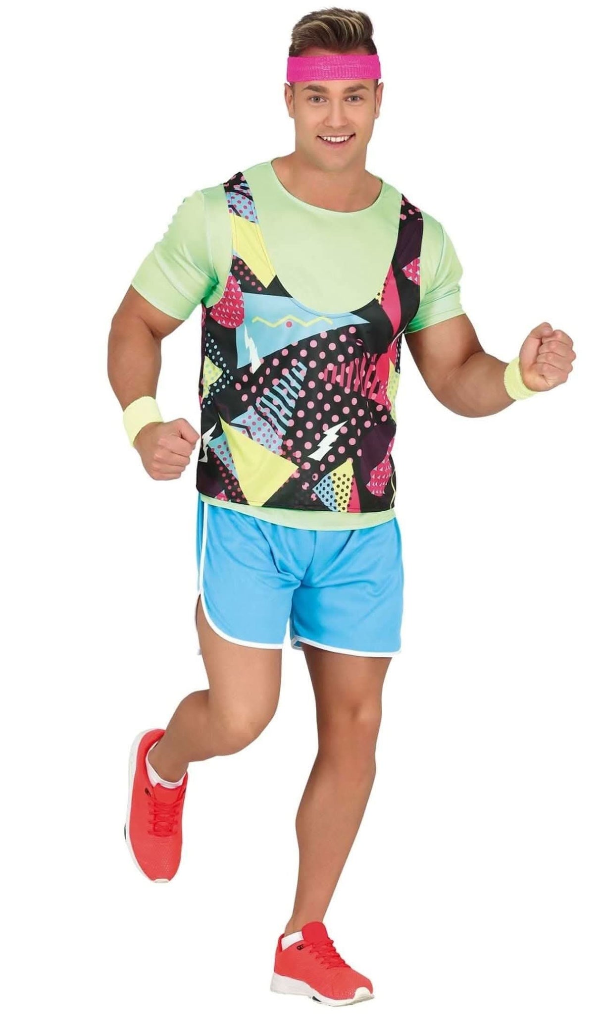 Man wearing 80s men's sports costume with colorful tank top, neon green shirt, blue shorts, pink headband, and red sneakers