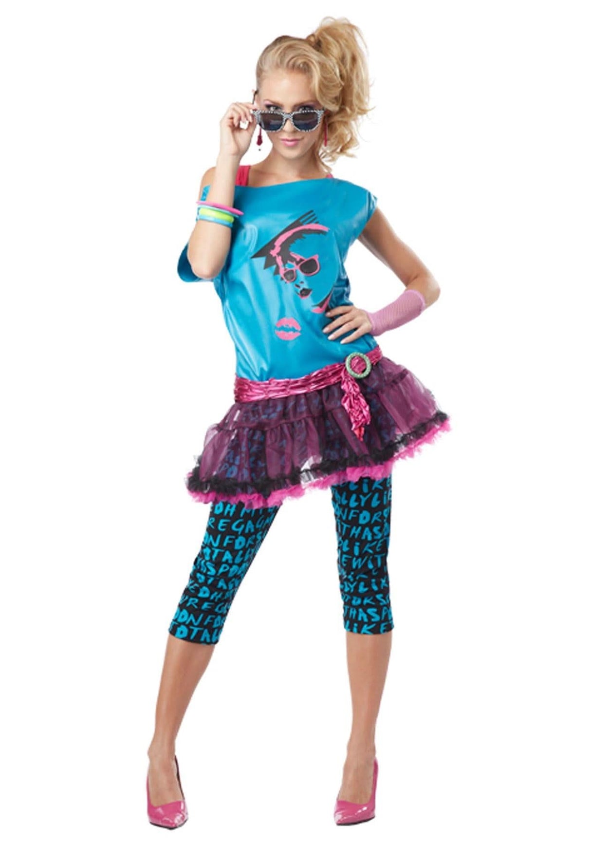 Woman wearing 80s valley girl costume for adults with bright blue graphic top pink tutu and patterned leggings
