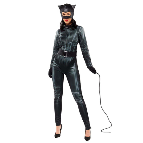 Woman wearing a sleek black Catwoman costume for women with a belt, gloves, mask, and whip
