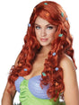Ariel inspired mermaid wig with long red curls decorated with sea-themed accessories on woman