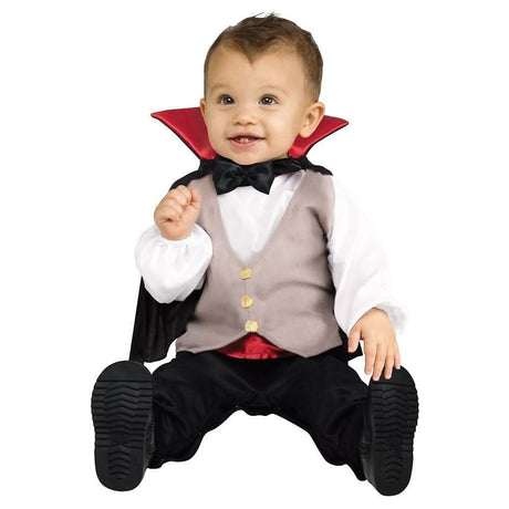 Baby wearing baby dracula halloween costume with black cape and red collar from CLICKK Home Store