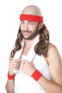 Man wearing bald men workout wig with long brown hair, red headband and wristbands holding a white towel