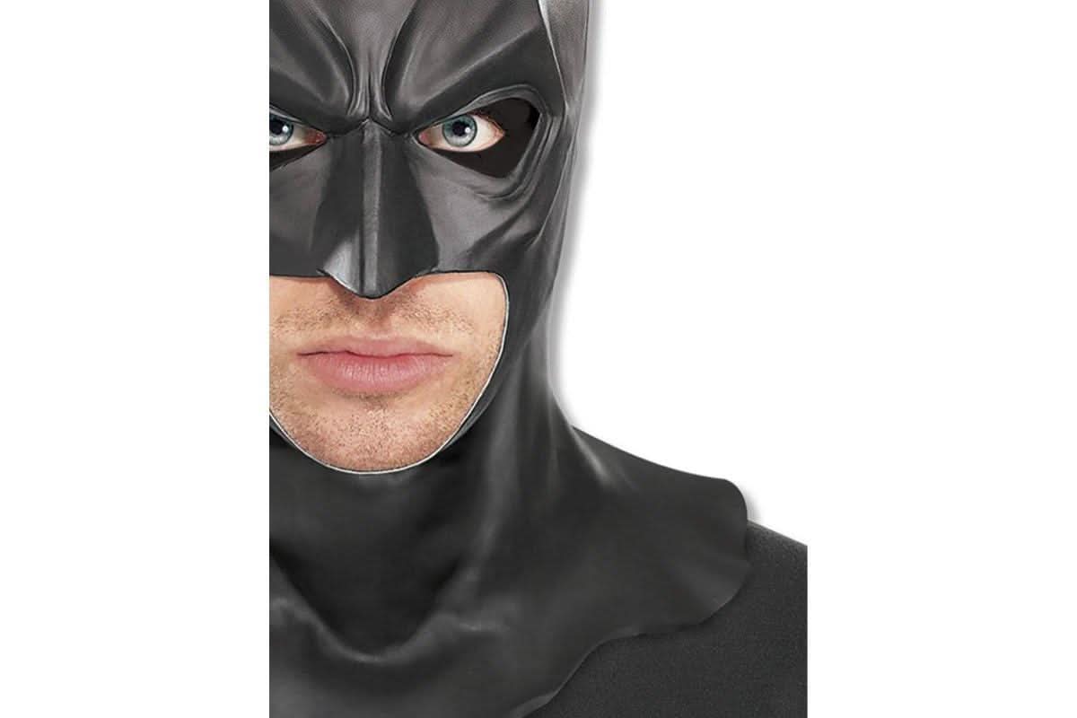 Close-up of a man wearing a Batman Dark Knight mask from Mens Fancy Dress