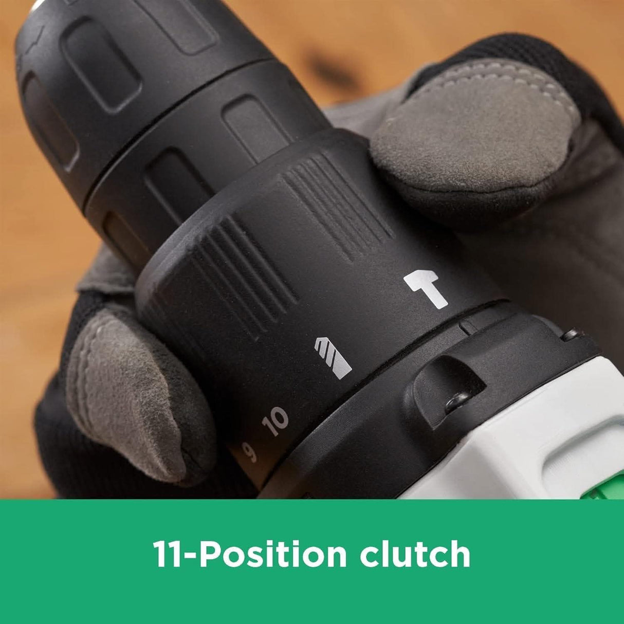 Close-up of 11-position clutch on Black and Decker 12v cordless drill held by gloved hand