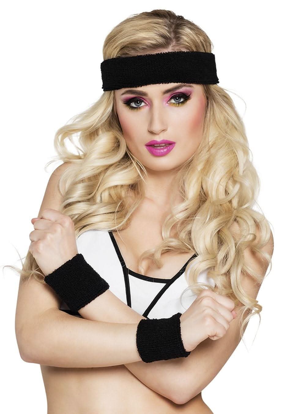 Woman wearing black sweatband set for sports with headband and wristbands from CLICKK Home Store