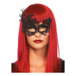 Black Venetian mask for women with intricate lace design worn by woman with red hair