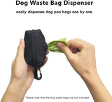 Hands using black dog waste bag dispenser pulling out green bag no pull dog harness medium