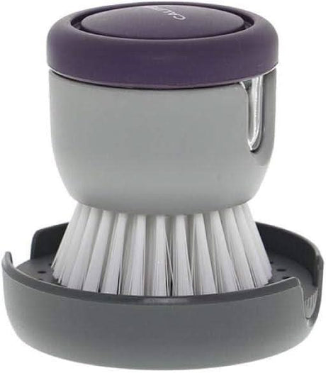Calitek detergent dispensing dish brush with white bristles and gray holder for easy kitchen cleaning