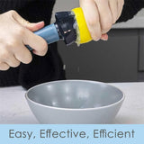 Calitek ergonomic lemon reamer extracting juice from lemon over a grey bowl