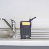 Calitek kitchen sink organizer with scrub brush and sponge holder in gray on countertop