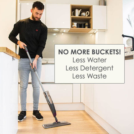 Man using Calitek microfiber spray mop bottle replacement for efficient floor cleaning in modern kitchen