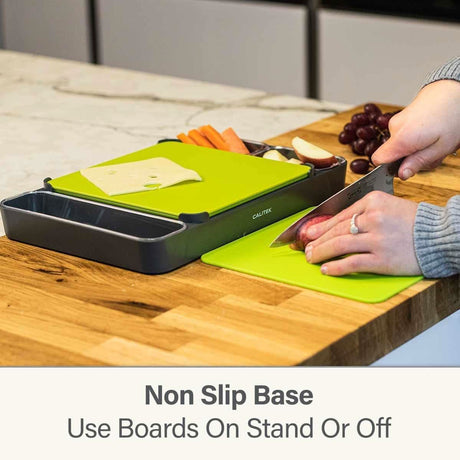 Calitek multipurpose chopping board set with non slip base used for cutting vegetables and cheese on wooden countertop
