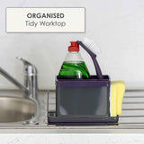 Calitek purple sink caddy organizer holding dish brush, sponge, and dish soap bottle on kitchen sink