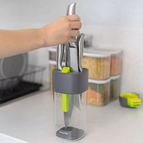 Calitek universal knife block with sharpener holding multiple stainless steel kitchen knives on a countertop