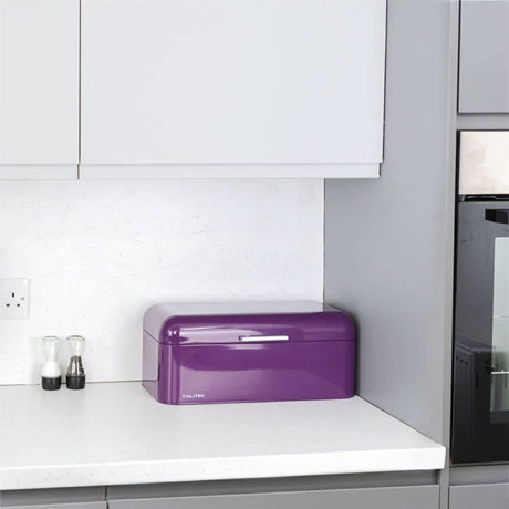 Calitek purple vintage bread bin on white kitchen countertop with modern gray cabinets