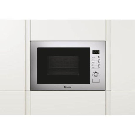 Candy 25L built-in microwave in stainless steel installed in white kitchen cabinetry