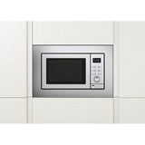 Stainless steel built-in microwave with grill installed in modern white kitchen cabinetry