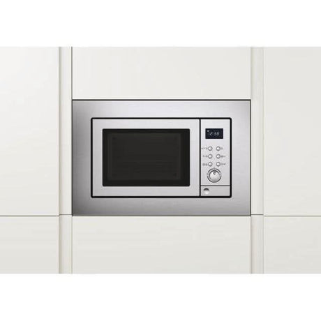 Stainless steel built-in microwave with grill installed in modern white kitchen cabinetry