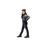 Girl wearing a black Catwoman kids costume 8-10 years with ears and boots standing confidently