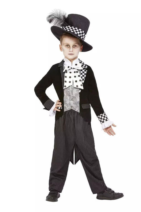 Child wearing a black and white child mad hatter costume with striped pants and feathered top hat