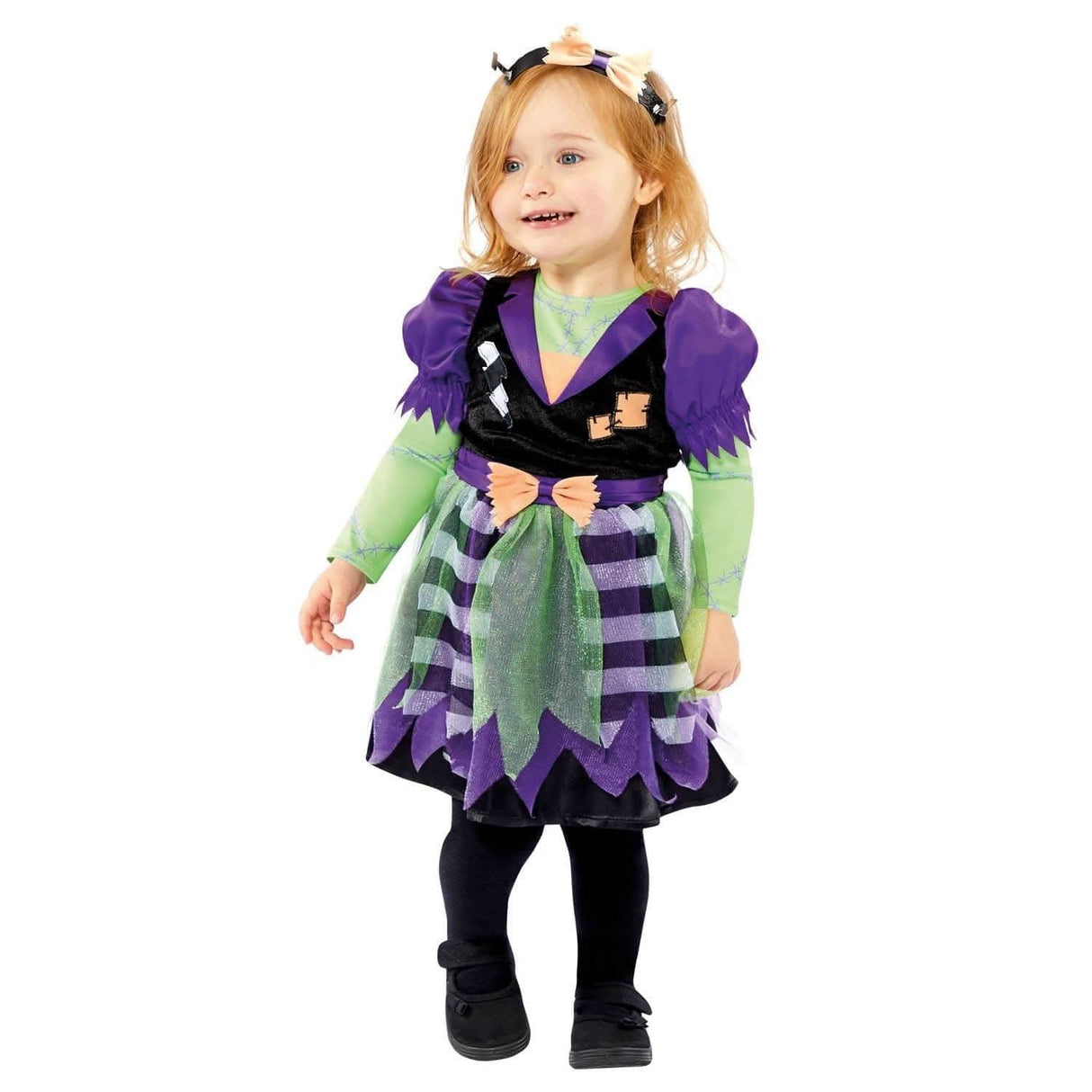 Toddler girl wearing a colorful child miss frankie costume with purple dress and green sleeves