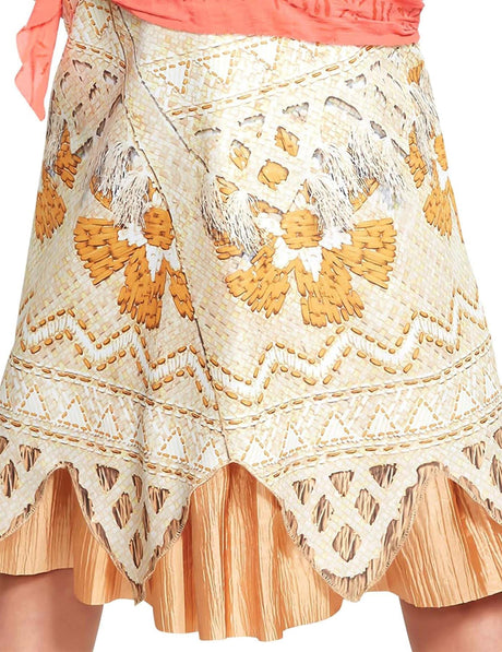 Close-up of a detailed skirt with fringes and floral patterns as part of a child Moana costume