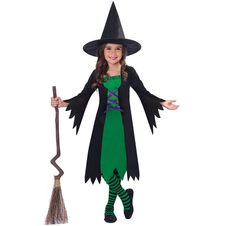 Child witch costume 4-6 years with green dress black sleeves striped tights and pointed hat holding broom