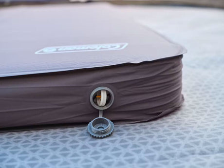 Close-up of CLICKK Home Store self inflating sleeping mat valve for quick air release and inflation