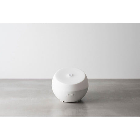 Homedics color changing essential oil diffuser with sleek round design for aromatherapy