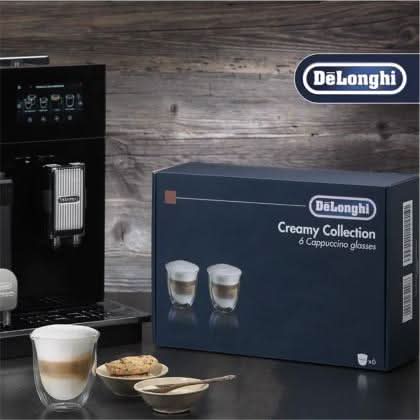 De'Longhi cappuccino glasses set box with two glasses and coffee machine on kitchen counter