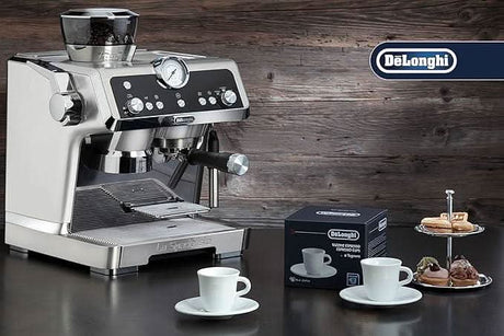 De'Longhi ceramic espresso cups set displayed with De'Longhi espresso machine and pastries